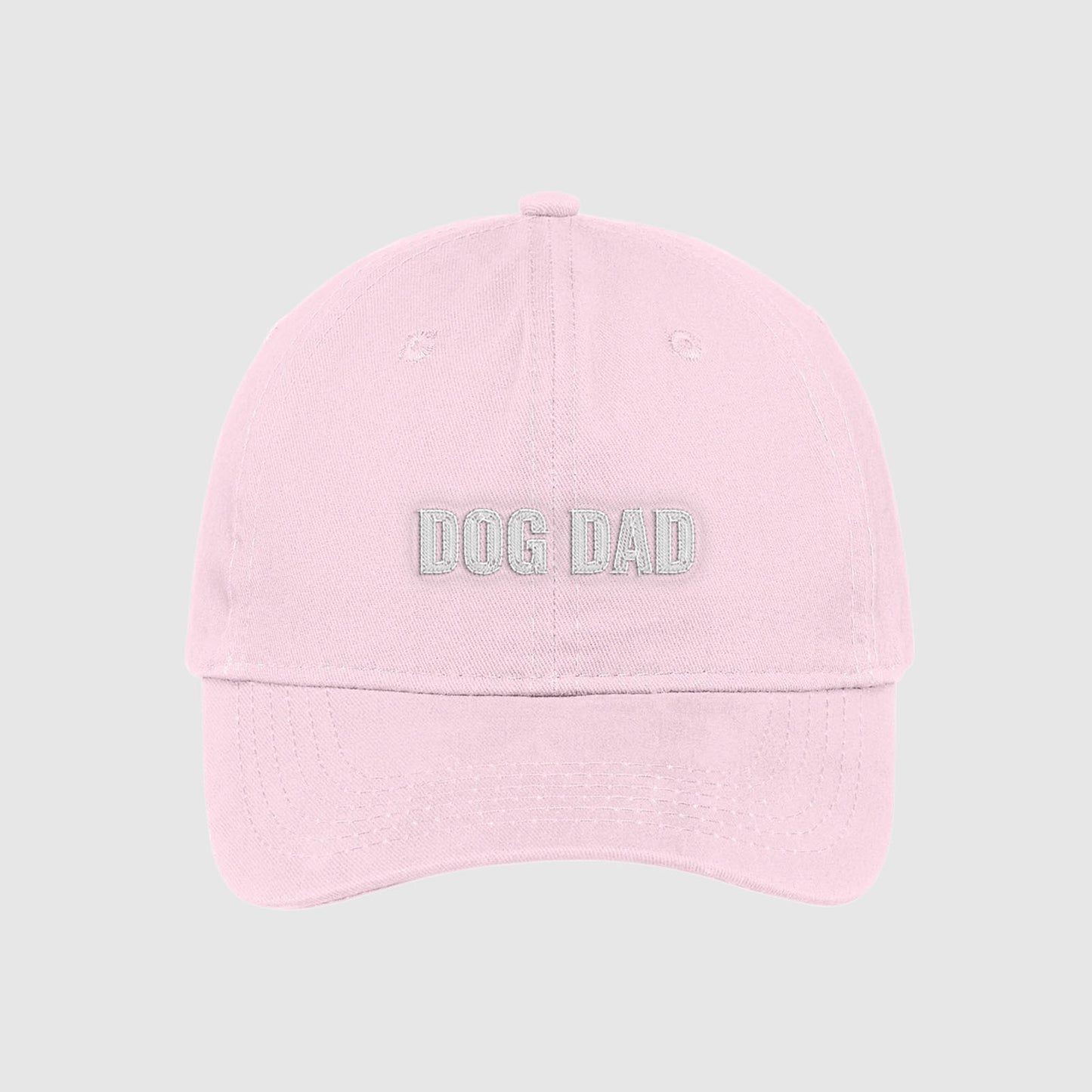 Blush pink Dog Dad Hat embroidered with white text